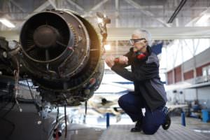 airplane mechanic working in a hot hangar